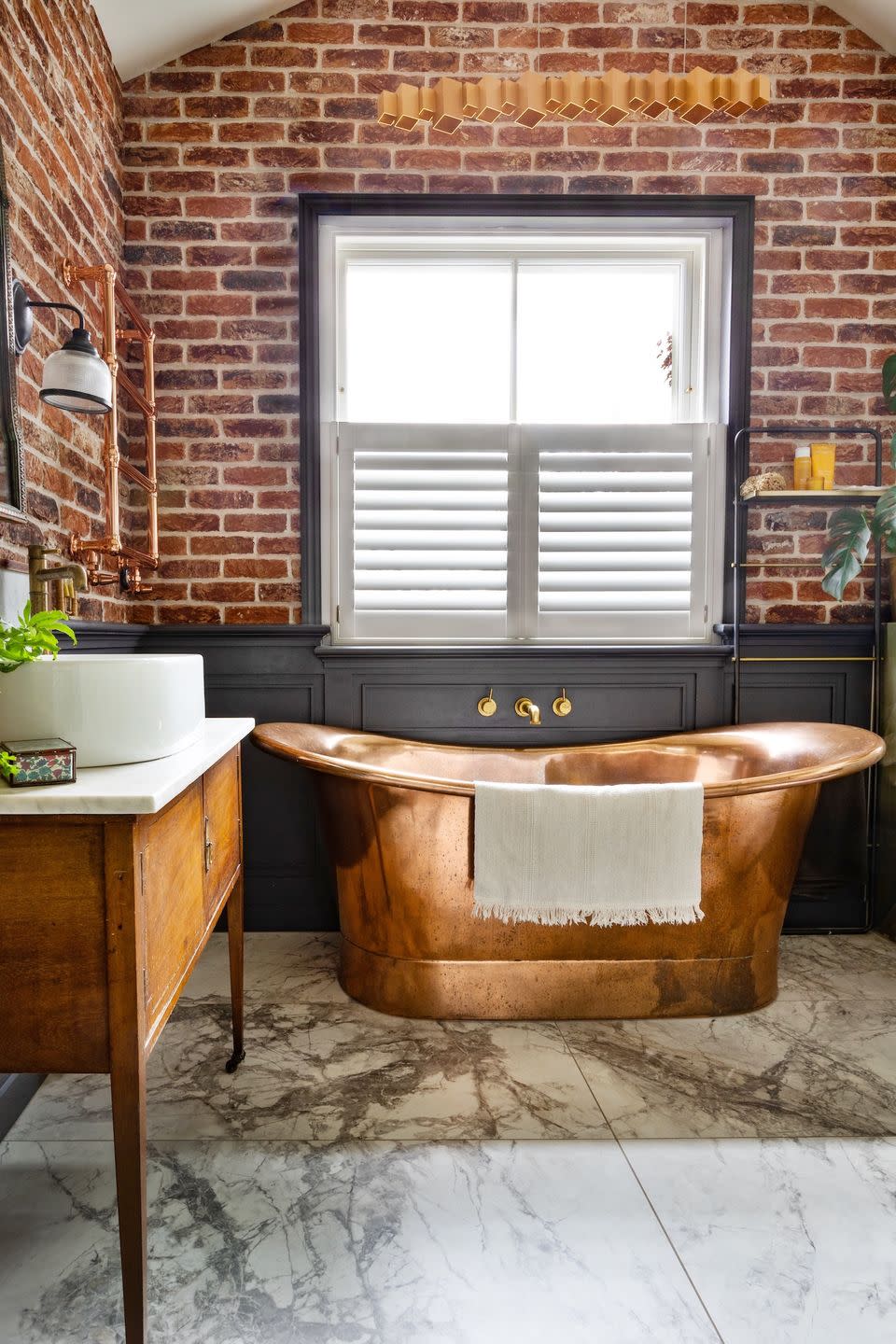 ensuite bathroom with copper bath