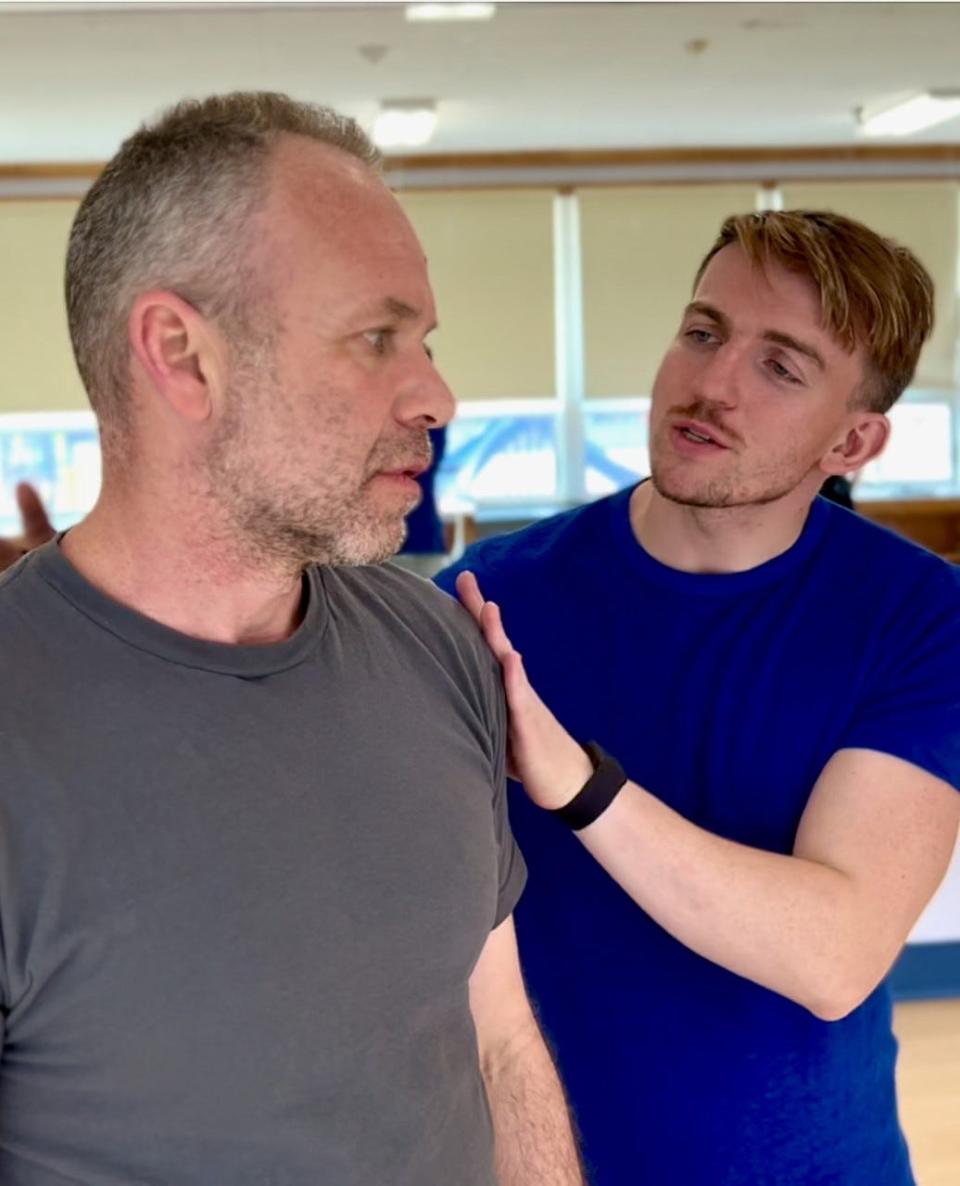 Tommy Walsh, right, and Joe MacDougall rehearse a scene from "Madame Executrix" written by Doug Asher-Best, which will be presented by Provincetown Dramatic Arts before the company travels to Ireland for a theater festival.