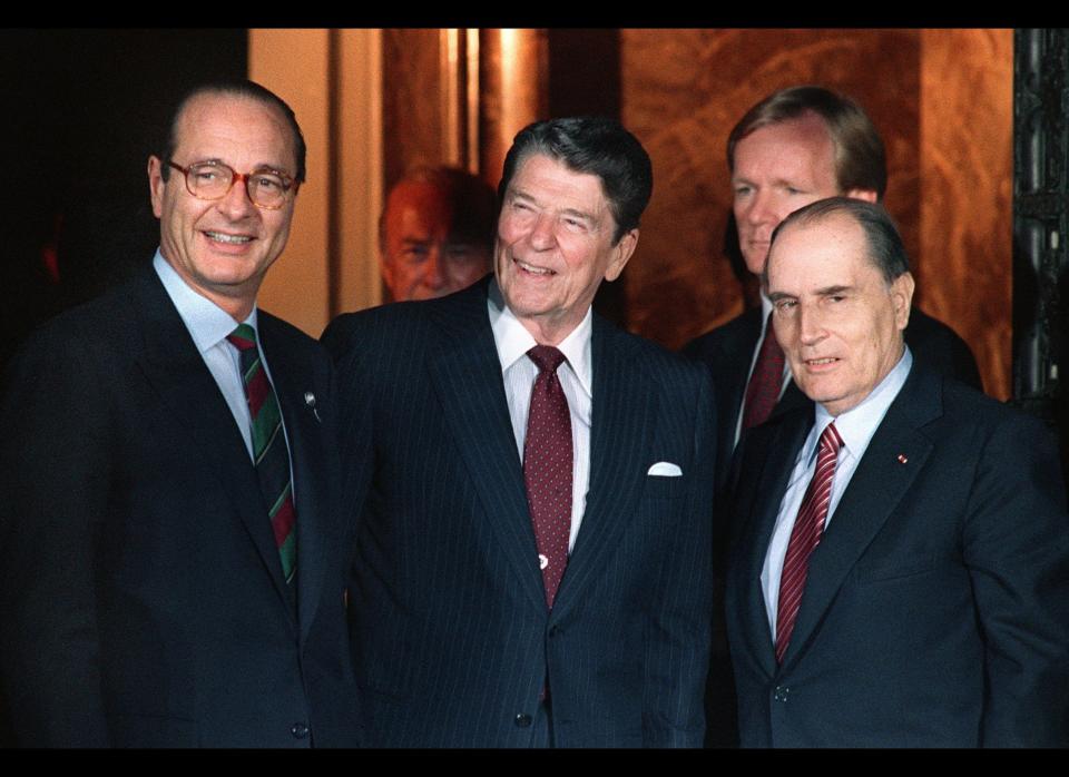 President Ronald Reagan signs COBRA, a requirement that employers let former workers stay on the company health plan for 18 months after leaving a job, with workers bearing the cost. (MIKE SARGENT/AFP/Getty Images)