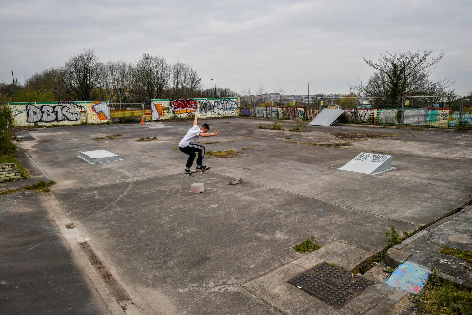 A solo skater exercises in a makeshift skate park on a derelict car wash site in Bristol as the UK continues in lockdown to help curb the spread of the coronavirus.