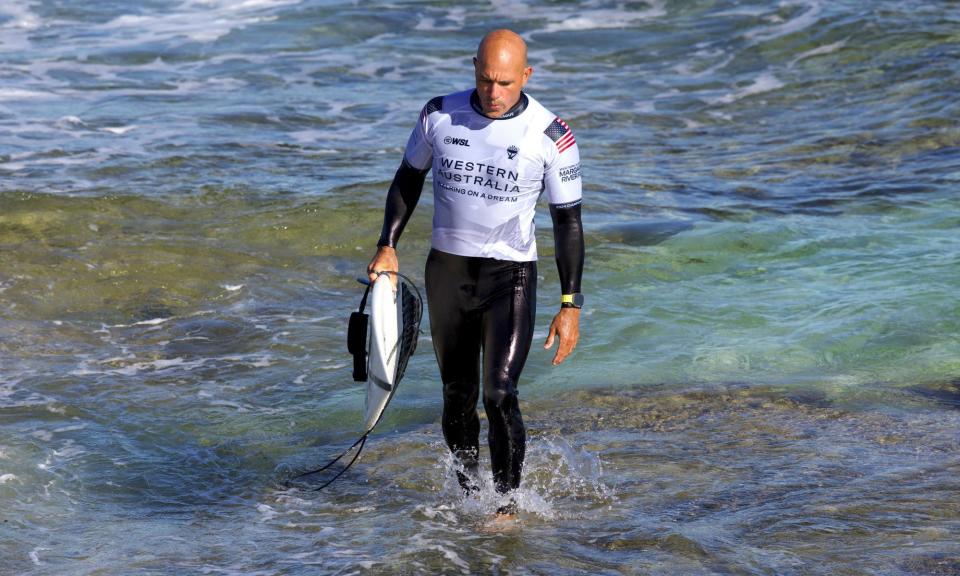 <span>Retirement appears to finally be on the cards after Kelly Slater ‘couldn’t quite pull a miracle off’ at the Margaret River Pro surfing competition.</span><span>Photograph: Colin Murty/AFP/Getty Images</span>