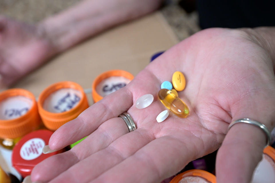 Retiree Donna Weiner shows some of the daily prescription medications that she needs and pays over $6,000 a year through a Medicare prescription drug plan at her home, Tuesday, Oct. 5, 2021, in Longwood, Fla.<span class="copyright">Phelan M. Ebenhack—AP</span>