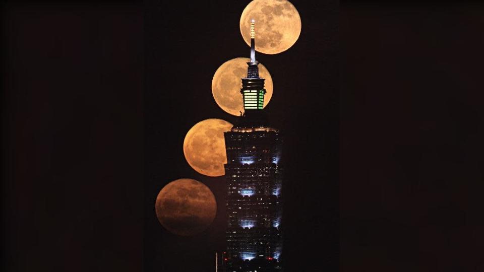 吳昆臻先生拍攝滿月與台北101大樓。（圖／翻攝自台北市立天文科學教育館官網）