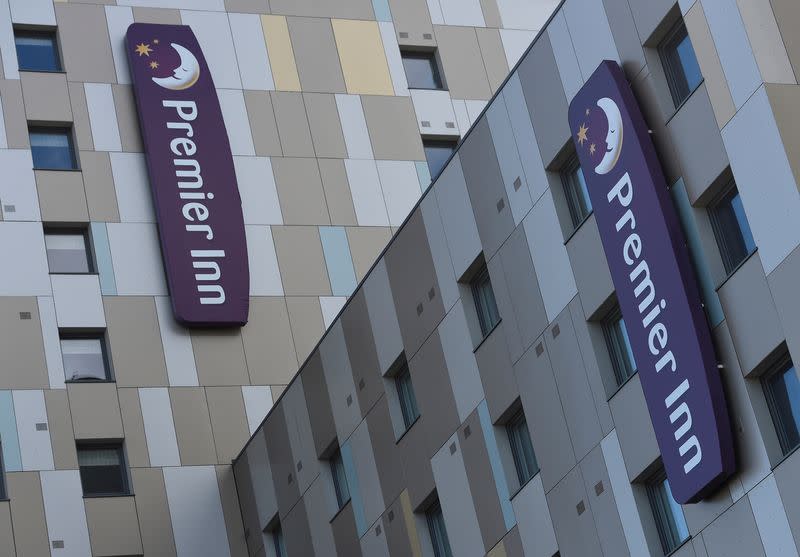 FILE PHOTO: Signage for Premier Inn is seen on the outside of one of their hotels in London, Britain