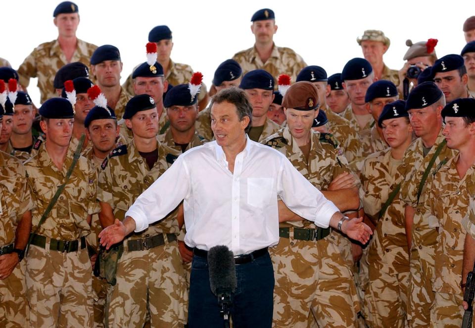 Britain's prime minister at the time Tony Blair addresses British troops in Basra, southern Iraq, May 29, 2003 (REUTERS)