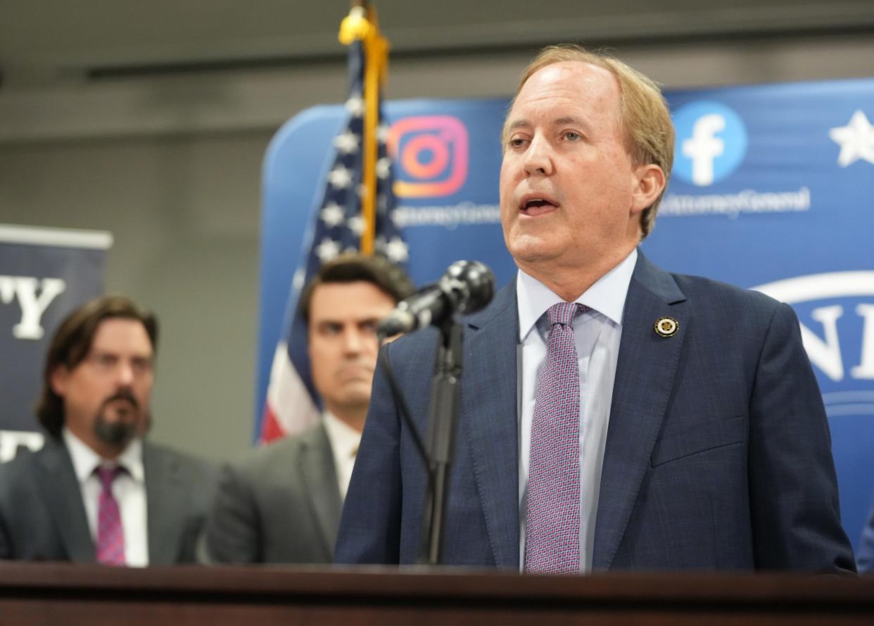 Attorney General Ken Paxton, shown at a May news conference, filed a lawsuit Nov. 30 accusing Pfizer of misrepresenting the effectiveness of its COVID-19 vaccine.