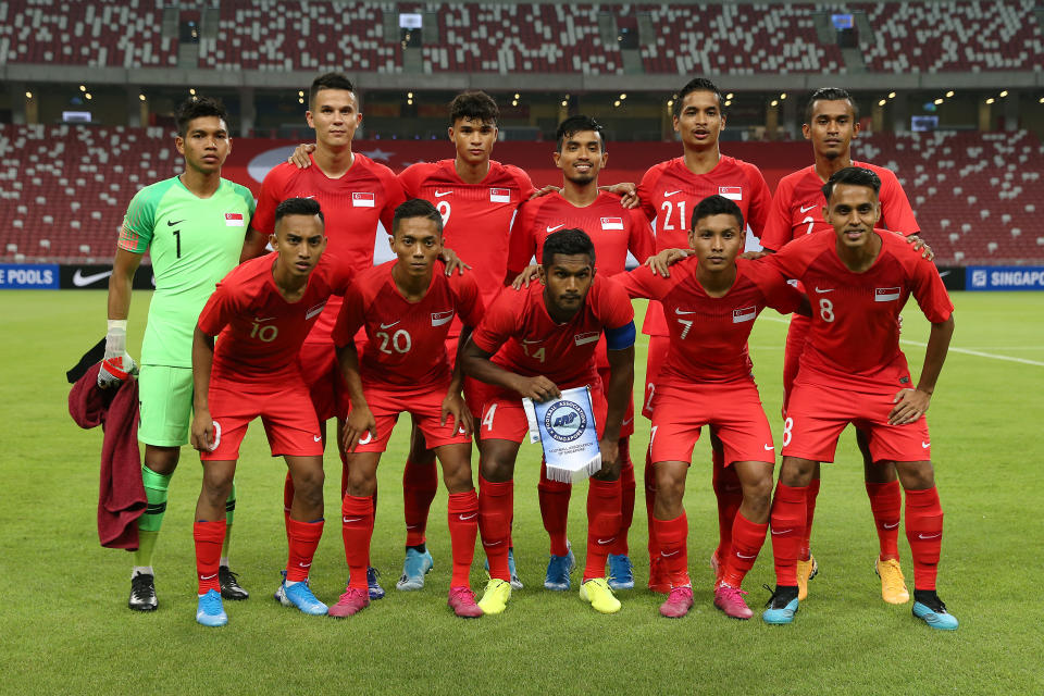 SINGAPORE, SINGAPORE - SEPTEMBER 05: Singapore pose for a team photograph before the FIFA World Cup Asian second qualifier Group D match between Singapore and Yemen at the National Stadium on September 05, 2019 in Singapore. (Photo by Lionel Ng/Getty Images)