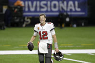 Tampa Bay Buccaneers quarterback Tom Brady leaves the field an NFL divisional round playoff football game against the New Orleans Saints, Sunday, Jan. 17, 2021, in New Orleans. The Buccaneers won 30-20. (AP Photo/Brett Duke)