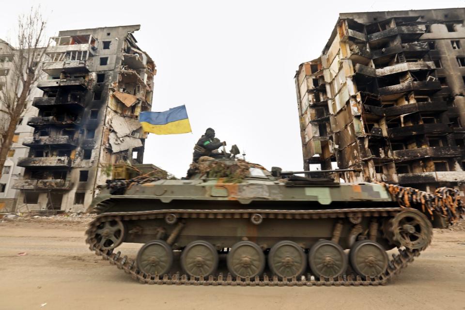 Ukrainian forces move through the town of Borodyanka, Ukraine.