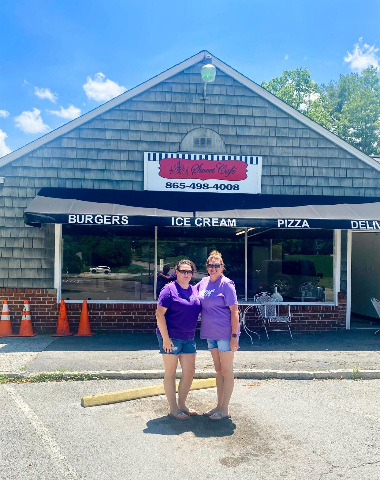 (Twisted) sisters Alecia Jackson (left) and Katie Eslinger pose in front of the building that will be the home of Twisted Sisters Sweets and Treats in Norris.