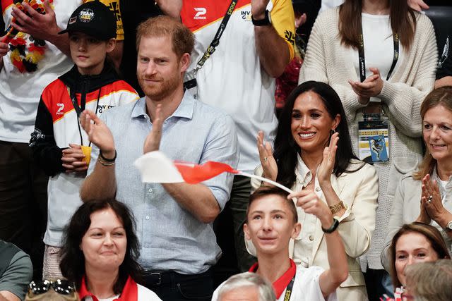 <p>Jordan Pettitt/PA Images via Getty Images</p> Prince Harry and Meghan Markle attend the Invictus Games on Sept. 15, 2023