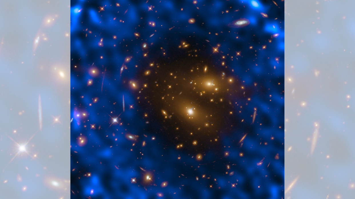  Twinkling golden stars surrounded by blue gas 