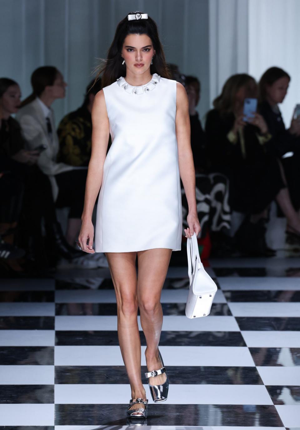 Kendall Jenner walks the runway at the Versace show