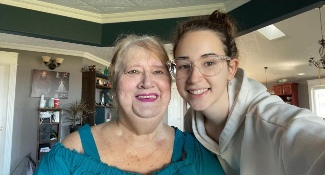 Abigail Skalaa is shown with her late grandmother Amelia (Mimi) Skalaa. The university student says rather than being focused solely on celebrating her grandmother's life, family members were distracted trying to stop an online scam.  (Submitted by Abigail Skalaa  - image credit)