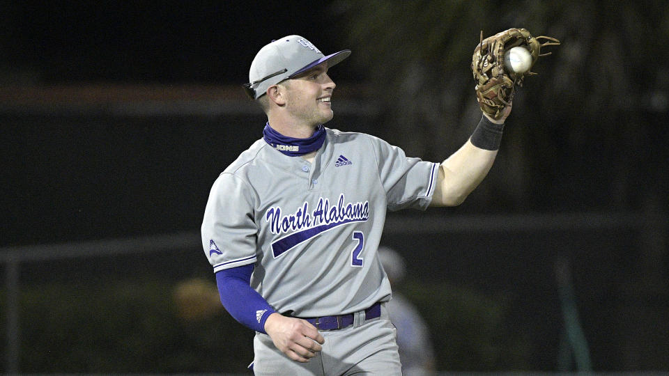 North Alabama infielder Drew Hudson (2) catches a throw during an NCAA college baseball game against Stetson on Friday, Feb. 26, 2021, in Deland, Fla. (AP Photo/Phelan M. Ebenhack)