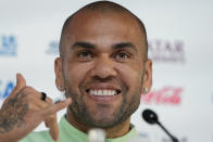 Brazil's Dani Alves smiles during a press conference on the eve of the group G of World Cup soccer match between Brazil and Cameroon in Doha, Qatar, Thursday, Dec. 1, 2022. (AP Photo/Andre Penner)