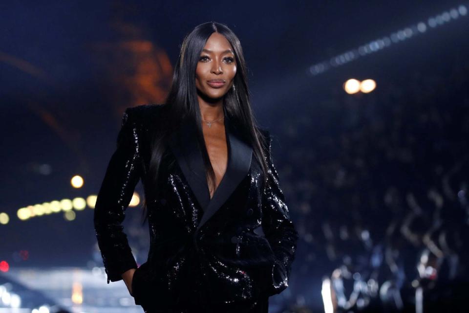 Naomi Campbell presents a creation by designer Anthony Vaccarello as part of his Spring/Summer 2020 women's ready-to-wear collection show for fashion house Saint Laurent during Paris Fashion Week 2019 (Reuters)