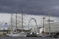 Polish ship Dar Mlodziezy (left) and Pogoria during the opening day of the Tall Ships Races event in Helsinki, Finland, Thursday July 4, 2024. Dozens of impressive classic sailing vessels from 13 different countries currently plying the Baltic Sea arrived at the Finnish capital on Thursday at the end of the first leg of the Tall Ships Races that kicked off from the Lithuanian port city of Klaipeda late June. (Aada Pet'j'/Lehtikuva via AP)