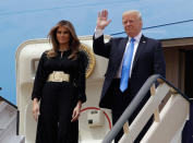 <p>President Donald Trump, right, and first lady Melania Trump arrive at the Royal Terminal of King Khalid International Airport, Saturday, May 20, 2017, in Riyadh. (Photo: Evan Vucci/AP) </p>