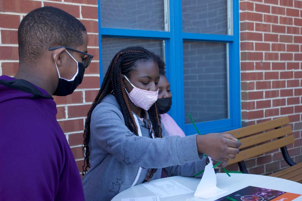 EastSide Charter School students Gabe Bass, Faith Brown and Blair Mundy work on a project at The Warehouse in Wilmington on Monday, November 8, 2021.