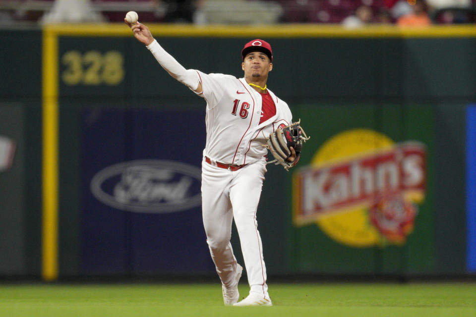 Cincinnati Reds third baseman Noelvi Marte throws out Minnesota Twins Max Kepler at first base in the sixth inning of a baseball game in Cincinnati, Monday, Sept. 18, 2023. (AP Photo/Jeff Dean)