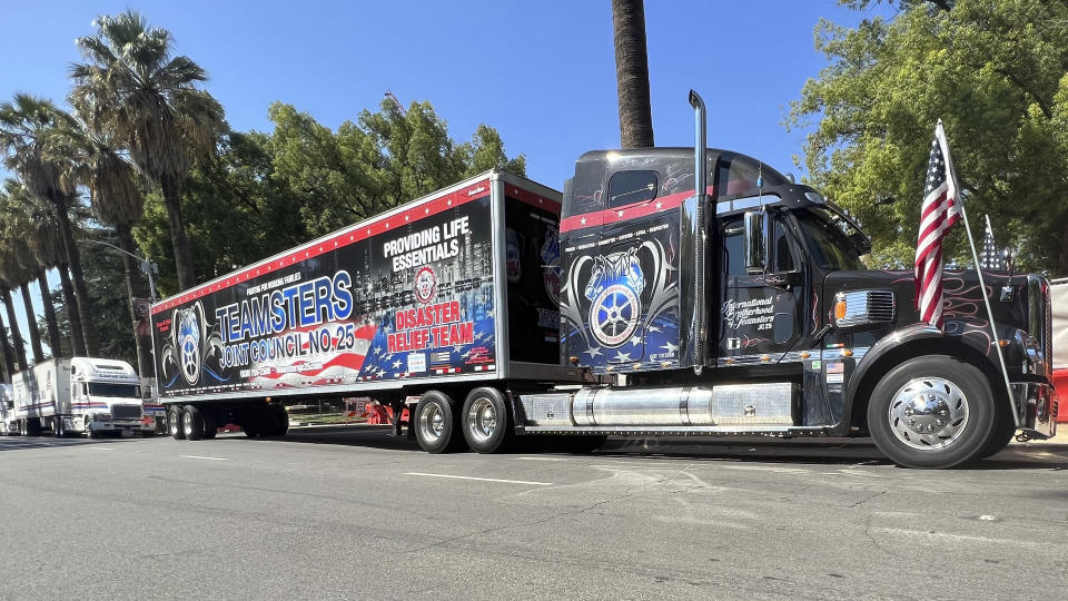 A truck sits as California truck drivers, union leaders, and lawmakers rallied outside the state Capitol in Sacramento, Calif., Tuesday, Sept. 19, 2023. They are demanding that Democratic Gov. Gavin Newsom sign a bill that would require self-driving semi-trucks to have a human present as they are tested on public roads for their safety. (AP Photo/Sophie Austin)