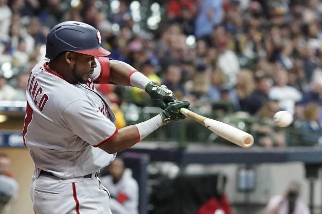 Lauer, Brewers beat Nationals 7-0 despite triple play