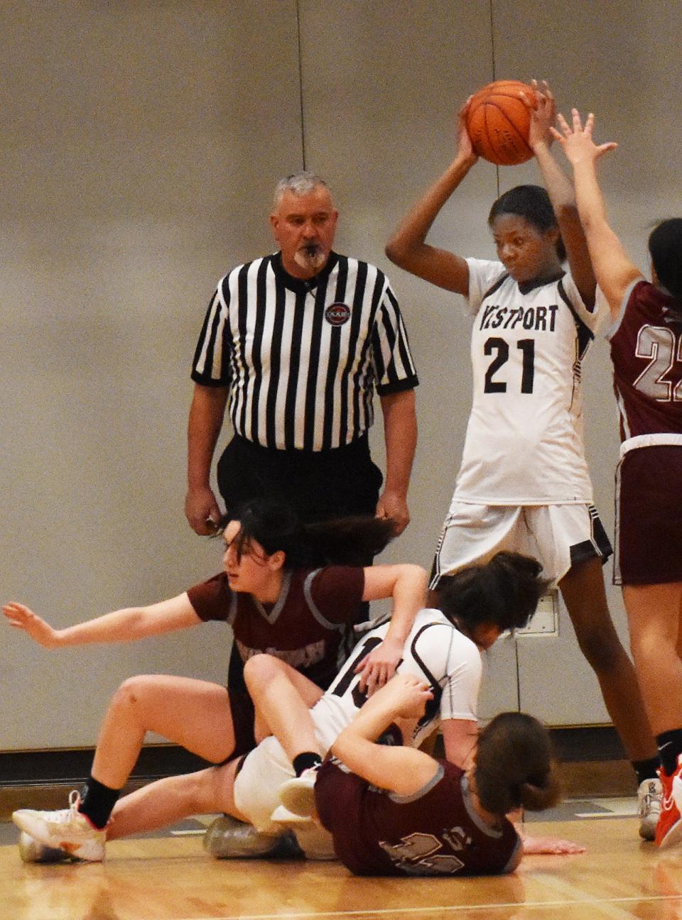 Westport's Jenna Egbe grabs a rebound.