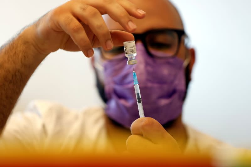 Medical worker prepares COVID-19 vaccination in Ashkelon