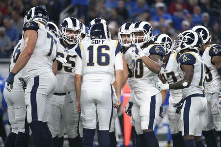 Dec 2, 2018; Detroit, MI, USA;Los Angeles Rams quarterback Jared Goff (16) and running back Todd Gurley (30) during a huddle during the game against the Detroit Lions at Ford Field. Mandatory Credit: Tim Fuller-USA TODAY Sports