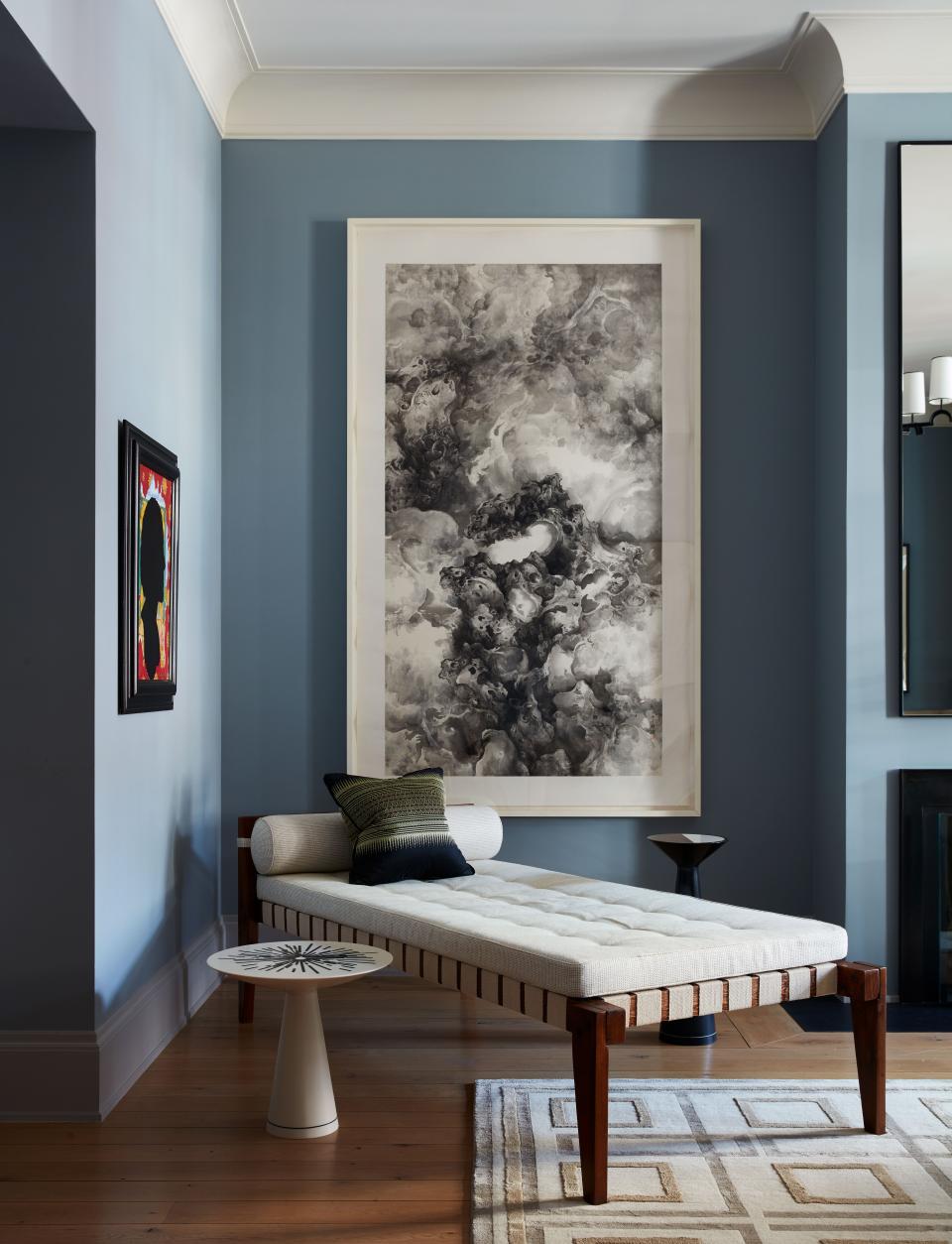 “My extensive travels through Asia have had a lasting influence on me,” says Nunnerley. In a corner of the living room a work by Chinese artist Tai Xiangzhou hangs above a Pierre Jeanneret chaise longue. A small painting to the left is a portrait of Nunnerley by New York artists (and longtime friends) McDermott & McGough. A side table from Nunnerley’s Celestial Collection for Maison Gerard. Decorative cushion of hand-woven fabric found on a trip to Lake Inle in Myanmar. Madison hand-knotted wool and silk rug from Nunnerley’s collection for The Rug Company.