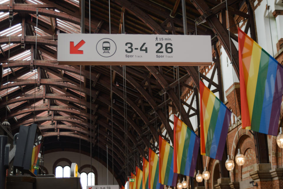 Copenhagen, Denmark - AUGUST 14, 2021: Rainbow flags inside of Copenhagen Central Station