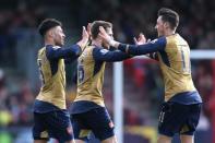 Football Soccer - AFC Bournemouth v Arsenal - Barclays Premier League - Vitality Stadium - 7/2/16, Alex Oxlade Chamberlain celebrates with team mates after scoring the second goal for Arsenal. Action Images via Reuters / Matthew Childs/Livepic