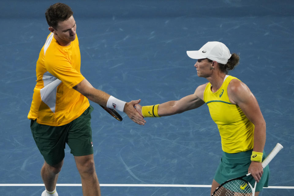 Australia's Samantha Stosur and John Peers celebrate a point win over Britain's Harriet Dart and Johnny O'Mara in their Group D mixed doubles match at the United Cup tennis event in Sydney, Australia, Friday, Dec. 30, 2022. (AP Photo/Mark Baker)