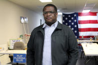 Daniel Henry poses at the campaign headquarters for the Duval County Democratic Party in Jacksonville, Fla., on Thursday, Oct. 22, 2020. Henry is the youngest chair of a major county political party in Florida. (AP Photo/Bobby Caina Calvan)