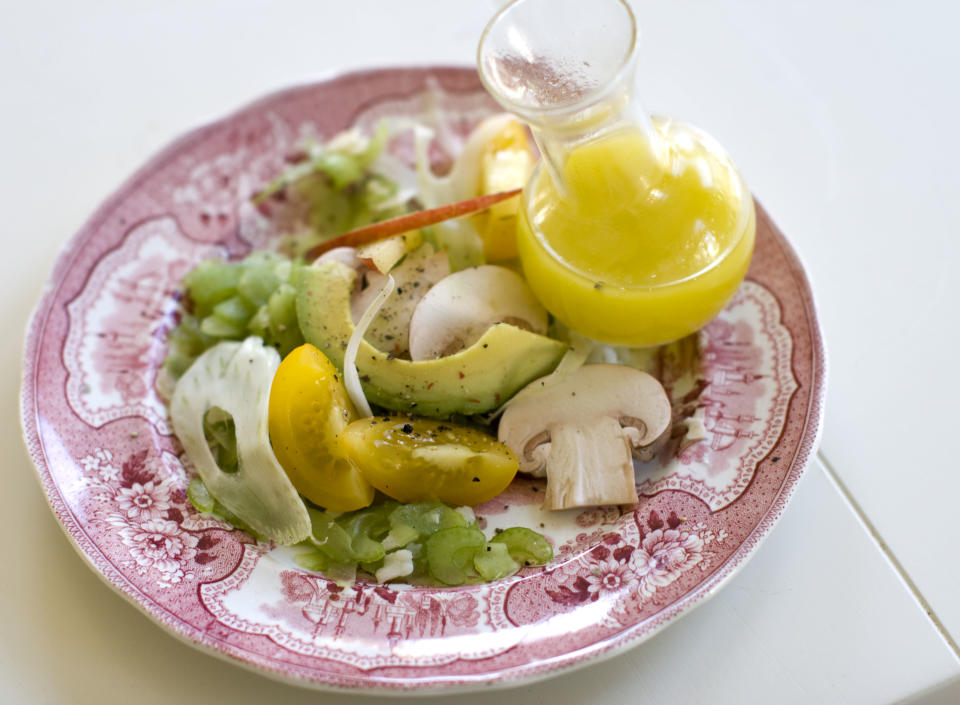 This Nov. 11, 2013 photo shows have-it-your-way celery salad in Concord, N.H. The humble celery stalk - high in fiber and low in calories - provides the foundation for this crunchy salad. Add a lemon vinaigrette, thin ribbons of real Parmigiano-Reggiano cheese and the add-ins of your choice to tailor the dish to your taste. (AP Photo/Matthew Mead)