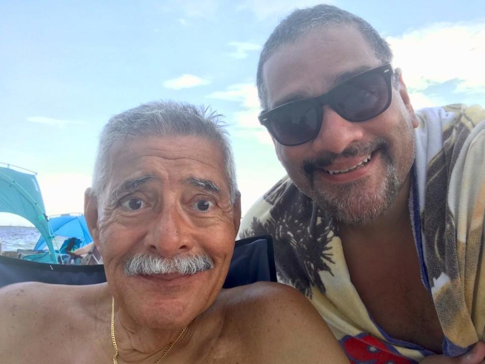 My dad, Rico Torres, and I mug it up for the camera on vacation.