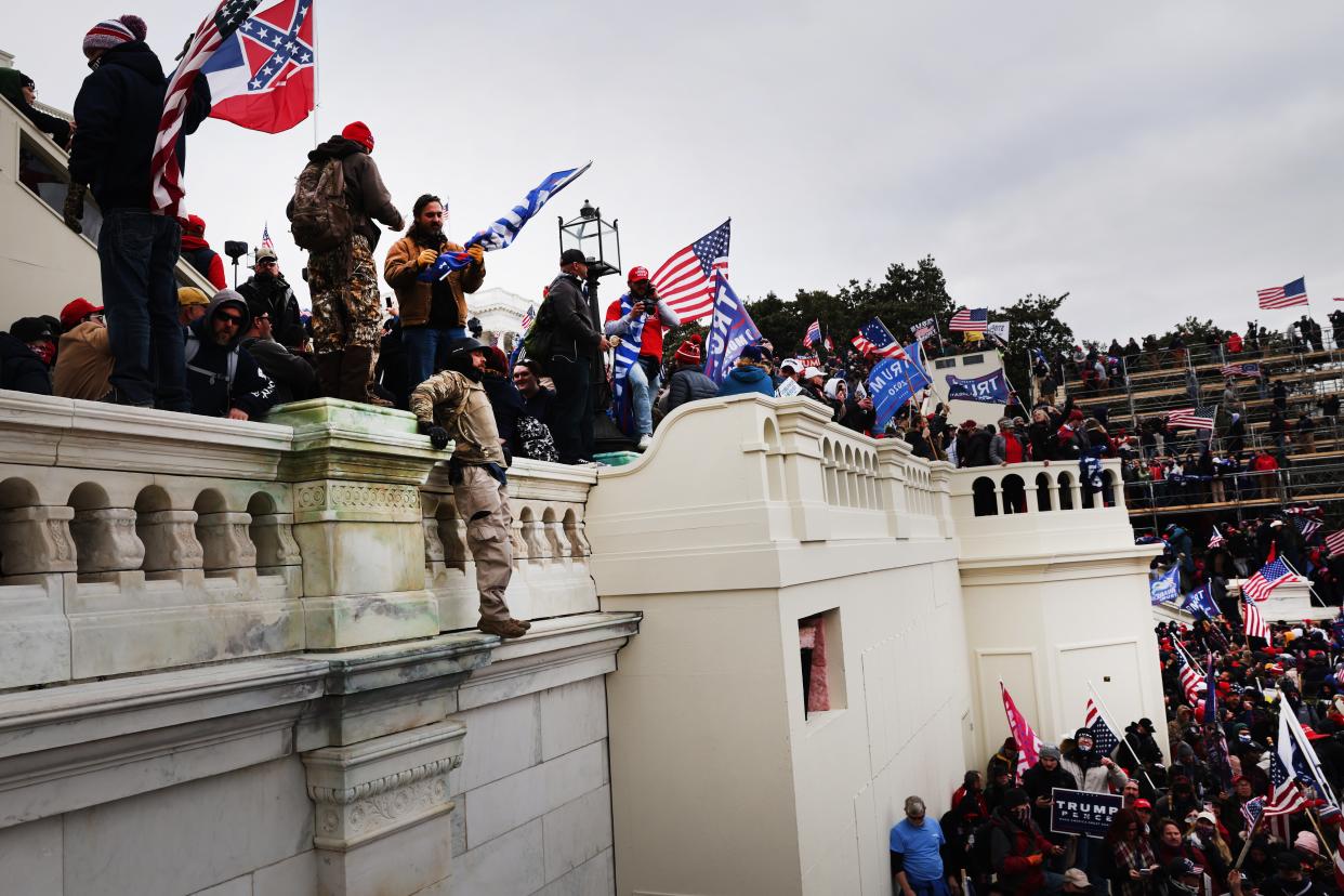 <p>Thousands of Donald Trump supporters storm the United States Capitol building following a 