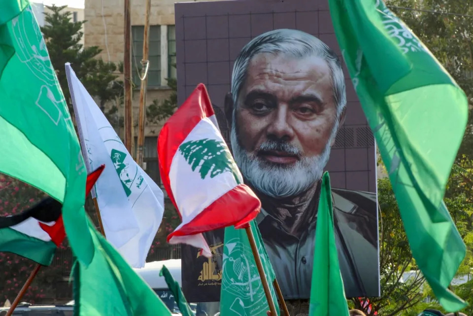 A portrait of the assassinated Hamas leader Ismail Haniyeh is displayed during a demonstration denouncing his killing in the Lebanese coastal city of Sidon (AFP via Getty Images)