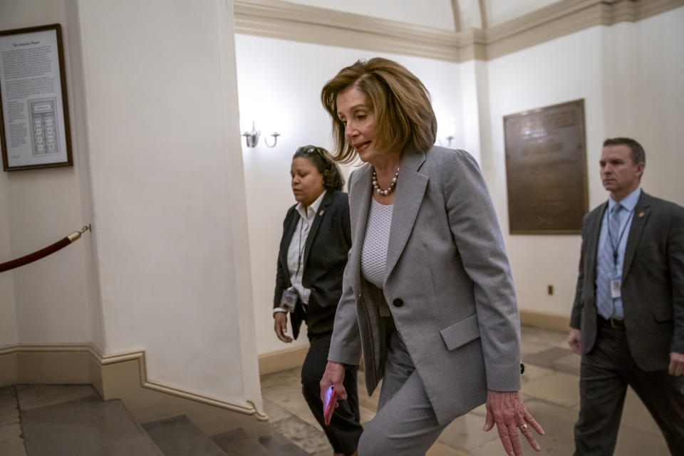 Speaker of the House Nancy Pelosi, D-Calif., arrives at the Capitol in Washington, Friday, Jan. 10, 2020. Pelosi hasn't relayed the articles of impeachment to the Senate for trial three weeks since President Donald Trump was impeached on charges of abuse and obstruction. Last night, she led the Democrat-controlled House in passing a measure limiting Trump's ability to take military action against Iran after he ordered the U.S. killing of a top Iranian general. (AP Photo/J. Scott Applewhite)