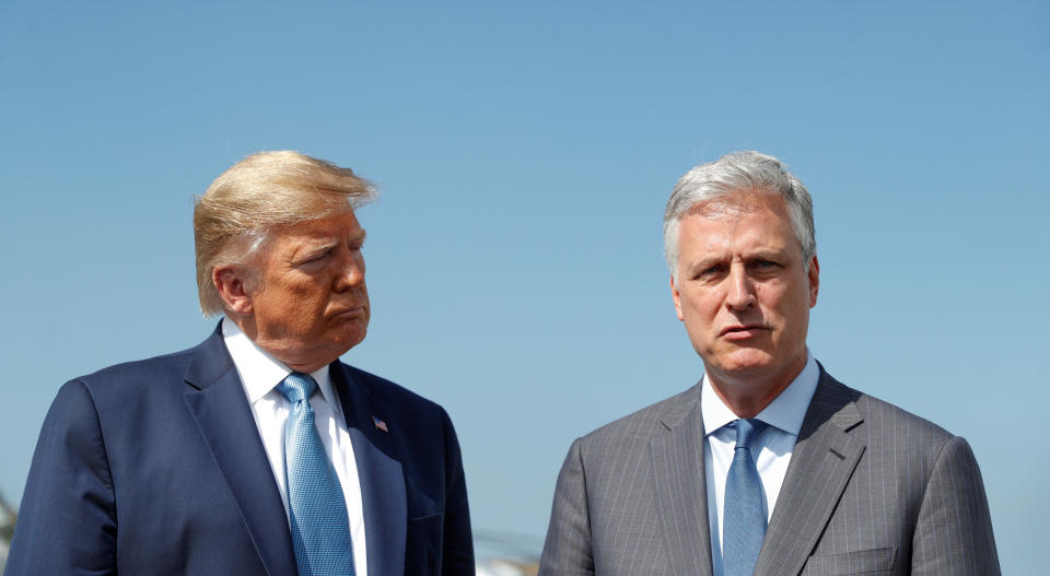 National Security Adviser Robert O’Brien, right, said Monday morning that it “obviously” looks as if former vice president Joe Biden won the election. (Tom Brenner/Reuters)