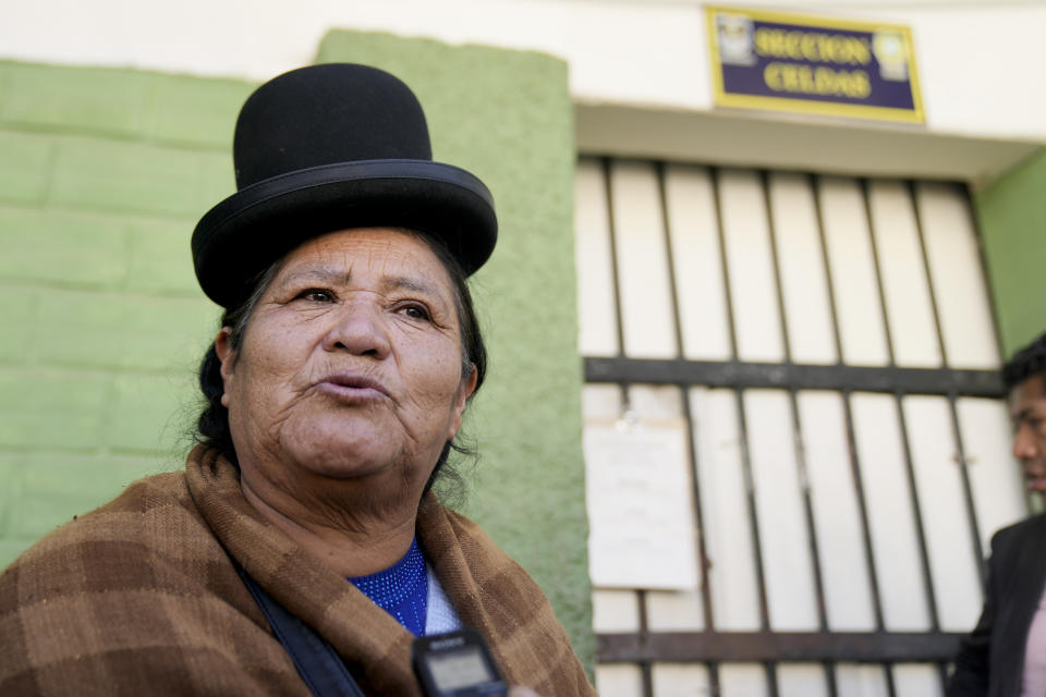 Satusa Apaza stands outside the jail where a relative of hers is being held in connection with his alleged involvement in what President Luis Arce called a coup attempt in La Paz, Bolivia, Friday, June 28, 2024. (AP Photo/Juan Karita)