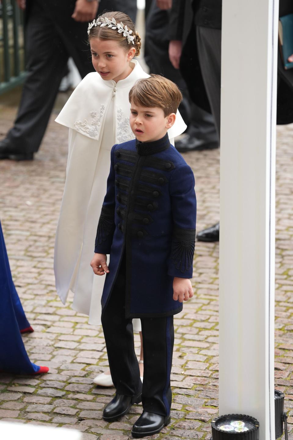 Prince Louis and Princess Charlotte arrive ahead of the Coronation of King Charles III and Queen Camilla on May 6, 2023 in London, England.