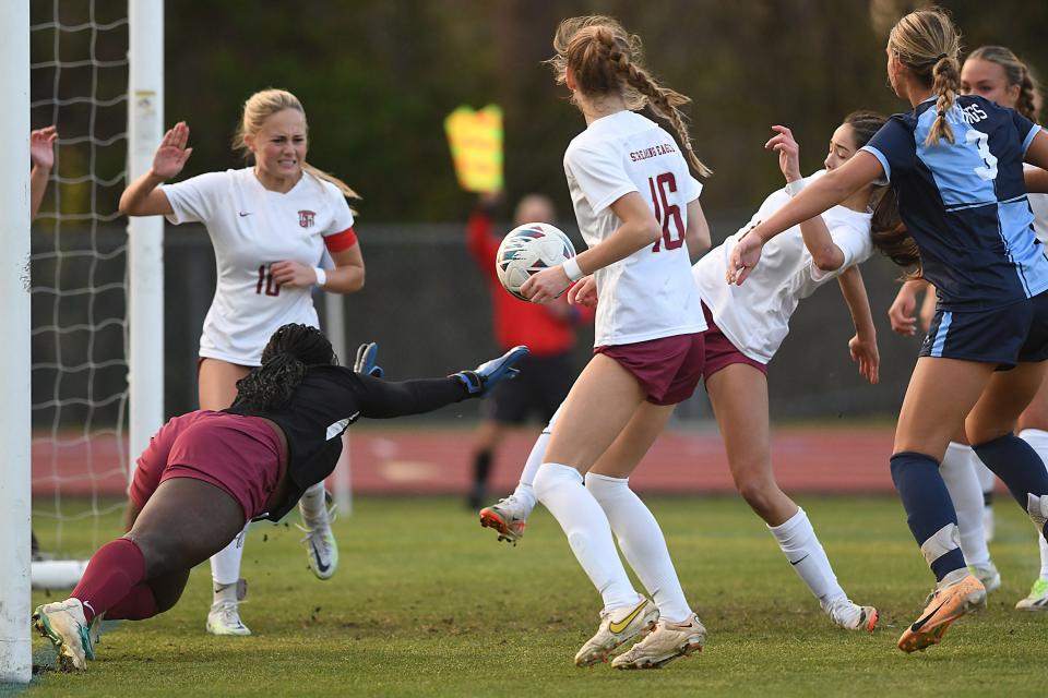 Ashley clears the ball from the goal as they took on Hoggard Tuesday March 26, 2024 at Scott Braswell Stadium in Wilmington, N.C. Ashley won 3-1. KEN BLEVINS/STARNEWS