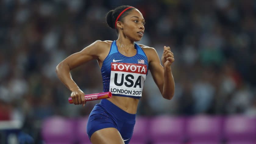 United States' Allyson Felix competes in the women's 4x400-meter final during the World Athletics Championships in London Sunday, Aug. 13, 2017. (AP Photo/Kirsty Wigglesworth)