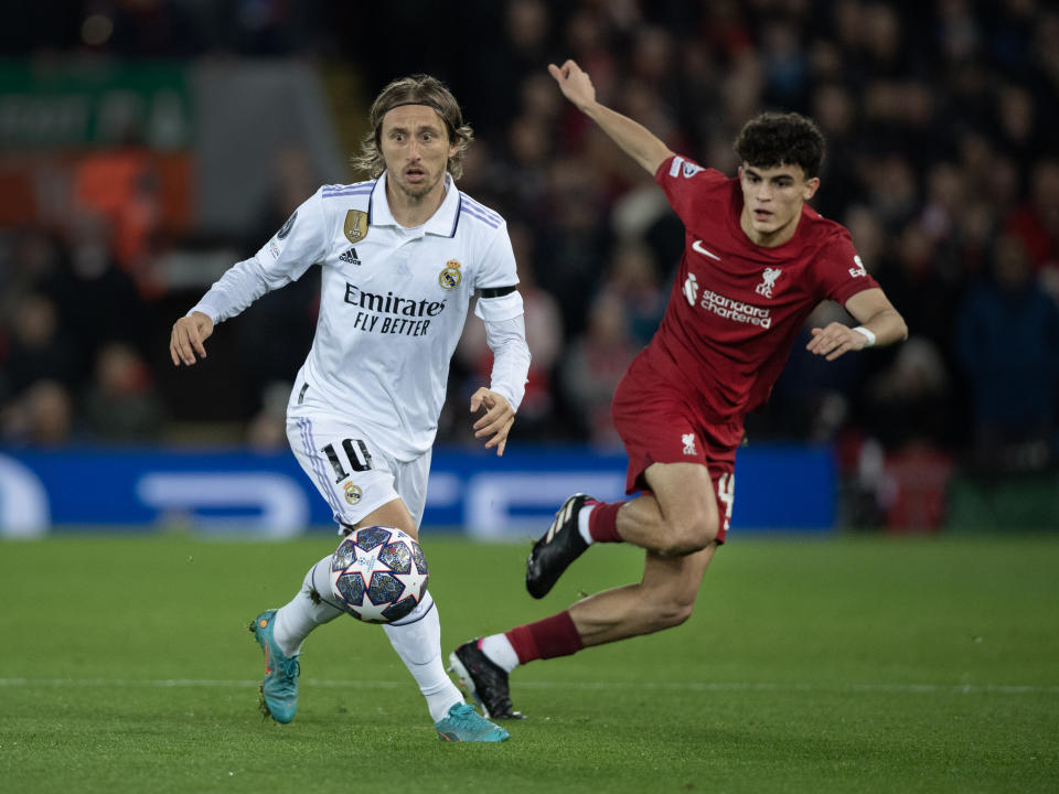 LIVERPOOL, ENGLAND - FEBRUARY 21: Stefan Bajcetic of Liverpool and Luka Modric of Real Madrid in action during the UEFA Champions League round of 16 leg one match between Liverpool FC and Real Madrid at Anfield on February 21, 2023 in Liverpool, United Kingdom. (Photo by Visionhaus/Getty Images)