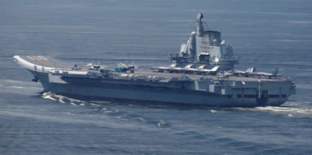 FILE PHOTO: China's aircraft carrier Liaoning departs Hong Kong, China, July 11, 2017. REUTERS/Bobby Yip