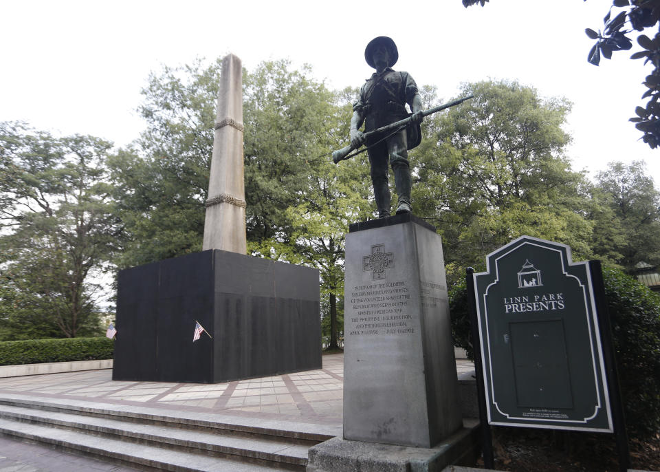 <p>A monument to volunteers of the Army of the Republic stands next to a confederate monument covered up by the mayor of Birmingham in Linn Park August 18, 2017 in Birmingham, Ala. Alabamas attorney general Steve Marshall sued the city of Birmingham and the mayor for partially covering the Confederate monument with a wooden box, citing it violated the Alabama Memorial Preservation Act. (Photo: Hal Yeager/Getty Images) </p>