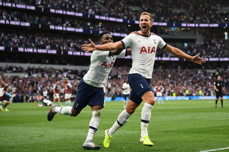 Tottenham Hotspur's English striker Harry Kane celebrates  scoring the team's second goal during the English Premier League football match between Tottenham Hotspur and Aston Villa at Tottenham Hotspur Stadium in London, on August 10, 2019. (Photo by Daniel LEAL-OLIVAS / AFP) / RESTRICTED TO EDITORIAL USE. No use with unauthorized audio, video, data, fixture lists, club/league logos or 'live' services. Online in-match use limited to 120 images. An additional 40 images may be used in extra time. No video emulation. Social media in-match use limited to 120 images. An additional 40 images may be used in extra time. No use in betting publications, games or single club/league/player publications. /         (Photo credit should read DANIEL LEAL-OLIVAS/AFP/Getty Images)