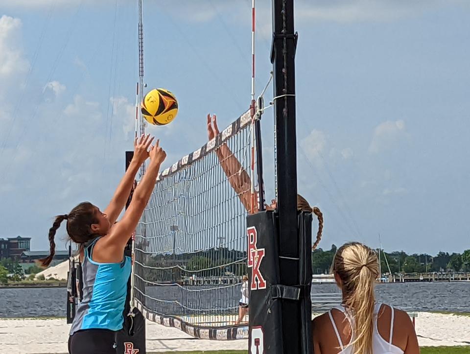 Bishop Kenny players run through high school beach volleyball practice ahead of the FHSAA championships on May 3, 2022. [Clayton Freeman/Florida Times-Union]